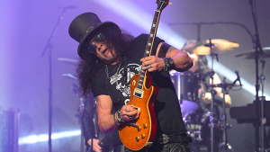 Proud Poppa Slash Gets Surreal With 19 Year-Old Son